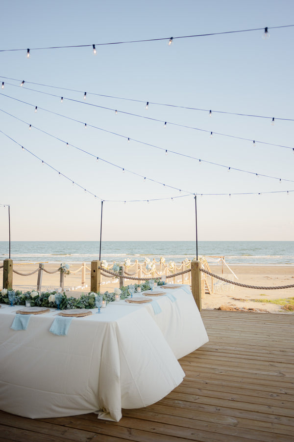 Seaside wooden deck dining