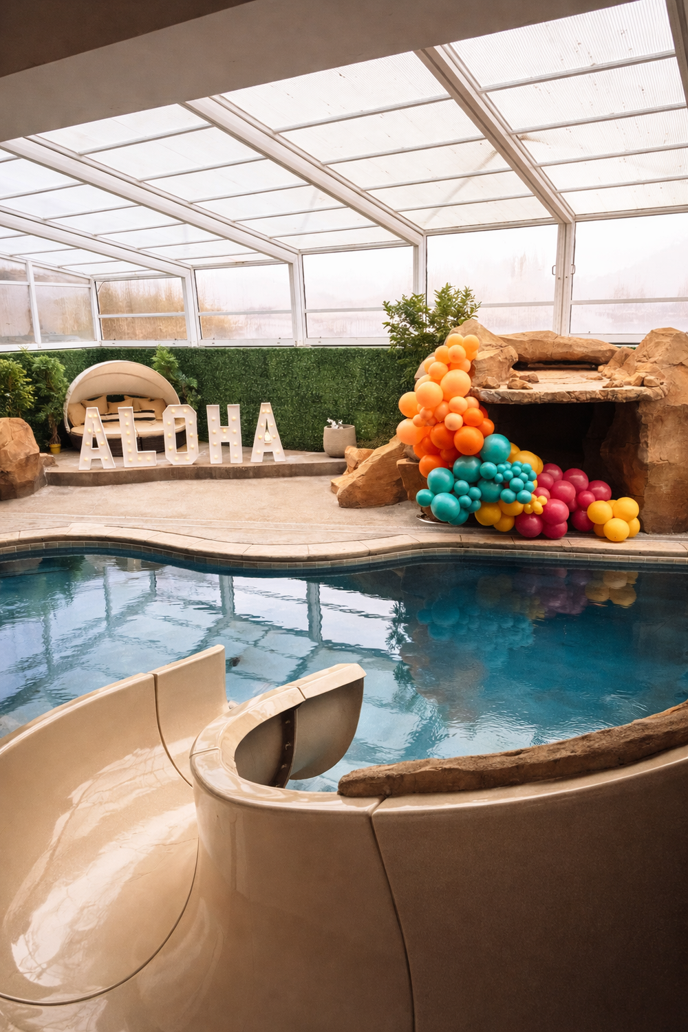 Indoor pool with ALOHA balloons