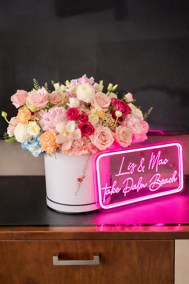 Neon pink floral box display